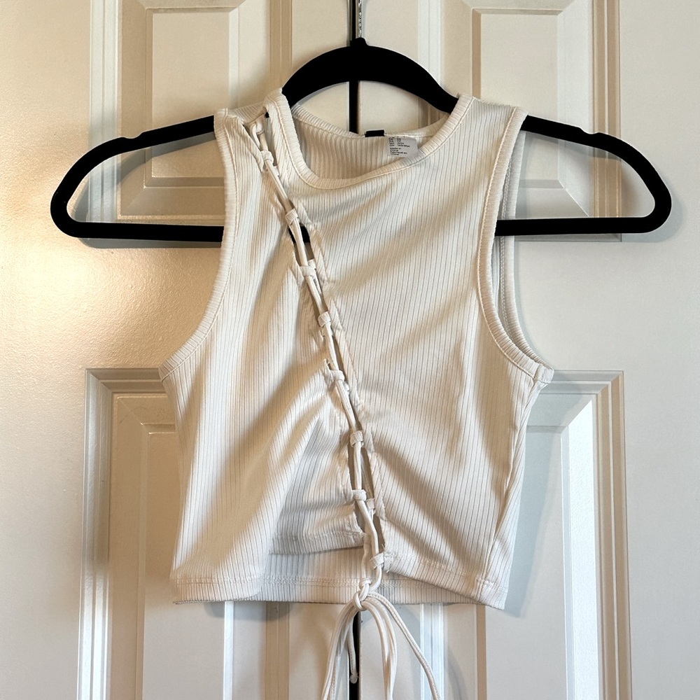 H&M white tank top. Size XS. Never worn tags still attached.